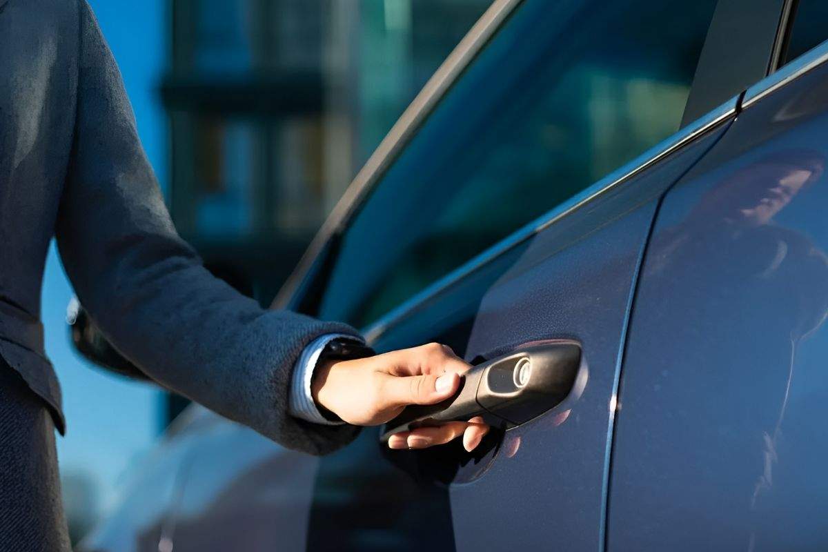 Discount Locksmith of Tucson locksmith installing a keypad deadbolt in Tucson, AZ