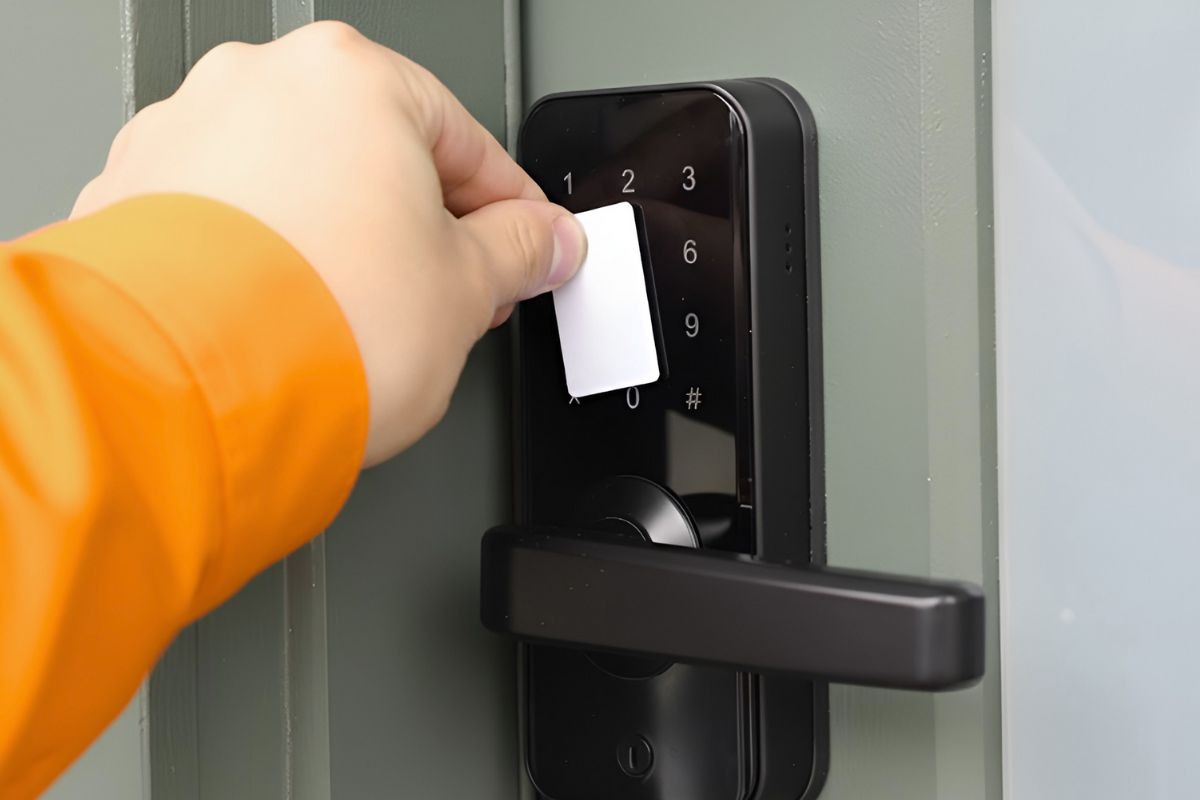 Discount Locksmith of Tucson technician installing a smart lock in Tucson, AZ